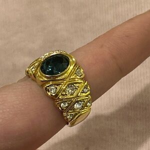 Blue sapphire & diamond ring in gold tone setting